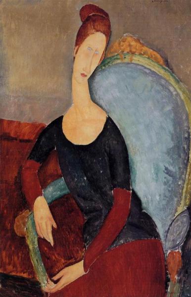 Portrait Of Jeanne Hebuterne Seated In An Armchair by Amedeo Modigliani