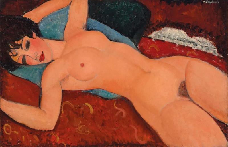 Reclining Nude On A Blue Cushion by Amedeo Modigliani