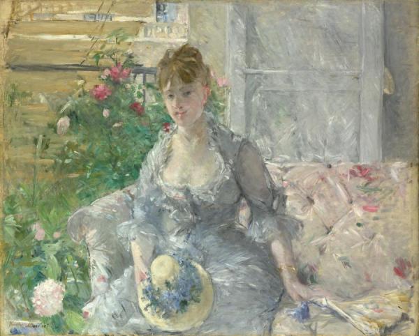 Young Woman Seated On A Sofa by Berthe Morisot