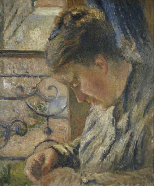 Portrait Of Madame Pissarro Sewing Near A Window by Camille Pissarro