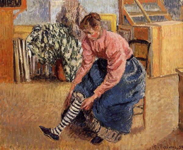 Woman Putting On Her Stockings by Camille Pissarro