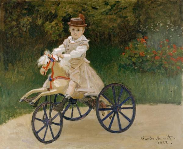 Jean Monet On His Hobby Horse by Claude Monet