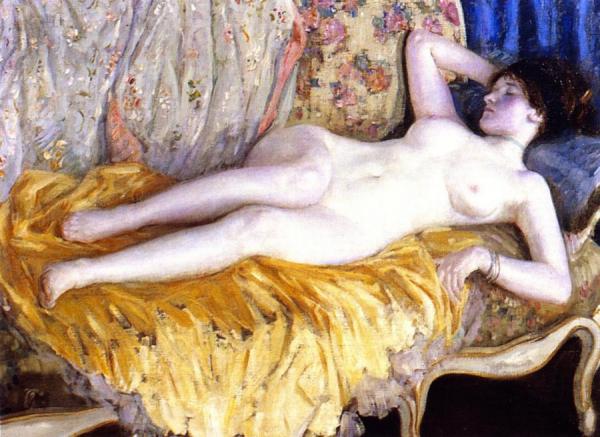 Lady On A Gold Couch by Frederick Carl Frieseke