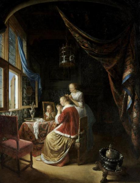 A Young Woman At Her Toilet by Gerrit Dou