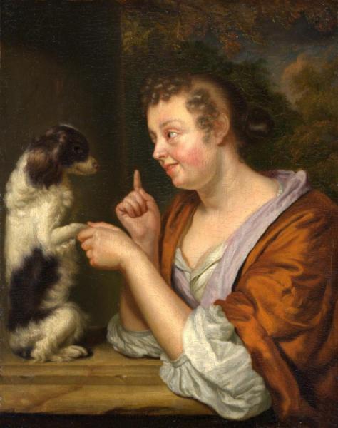 A Young Lady Playing With A Dog by Godfried Schalcken