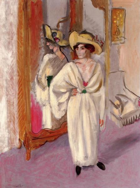 Woman In White In Front Of A Mirror by Henri Matisse