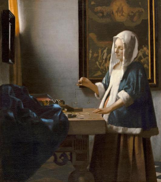 Woman Holding A Balance by Johannes Vermeer