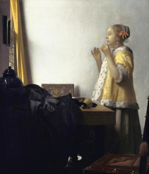 Young Woman With A Pearl Necklace by Johannes Vermeer