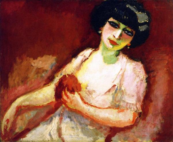 Woman In Pink Against A Red Background by Kees Van Dongen