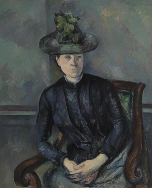 Woman In A Green Hat by Paul Cezanne