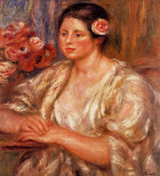 Madelaine In A White Blouse And A Bouquet Of Flowers by Pierre Auguste Renoir
