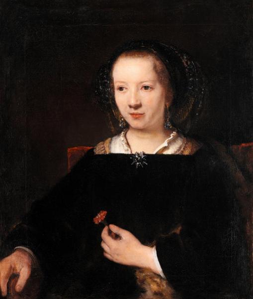Young Woman With A Carnation by Rembrandt Van Rijn