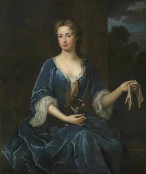 Portrait Of An Unknown Lady Holding A Black And White Dog by Sir Godfrey Kneller, Bt.